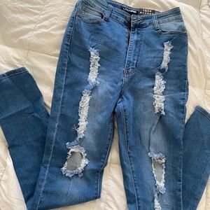 Fashion Nova ripped high rise jeans